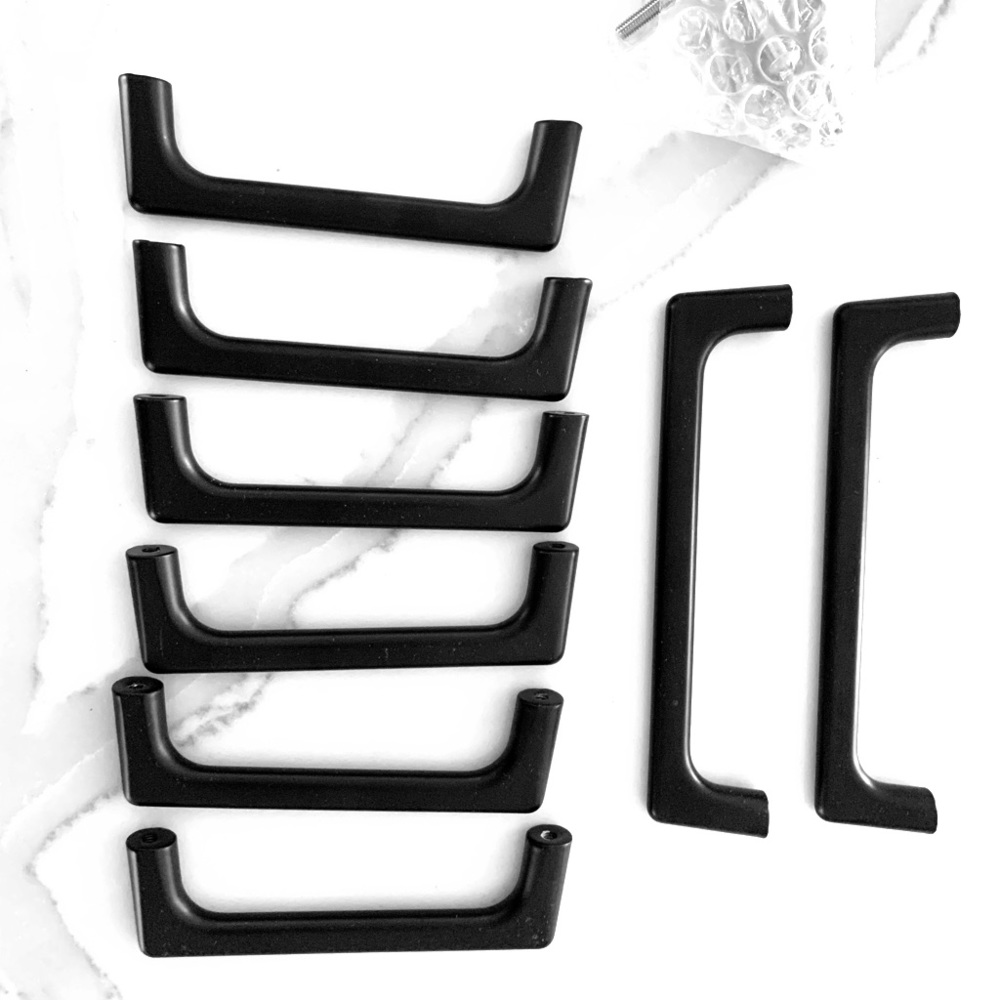 Modern sleek, black cabinet pulls